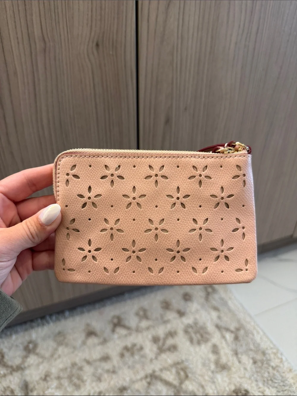Coach Peach Floral Perforated Wristlet